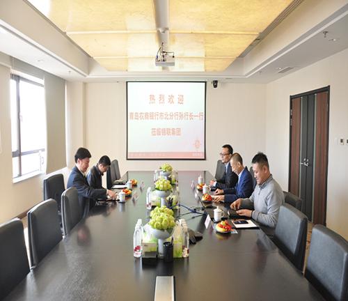 青岛农商银行市北分行行长孙巨仁一行到访锦联集团